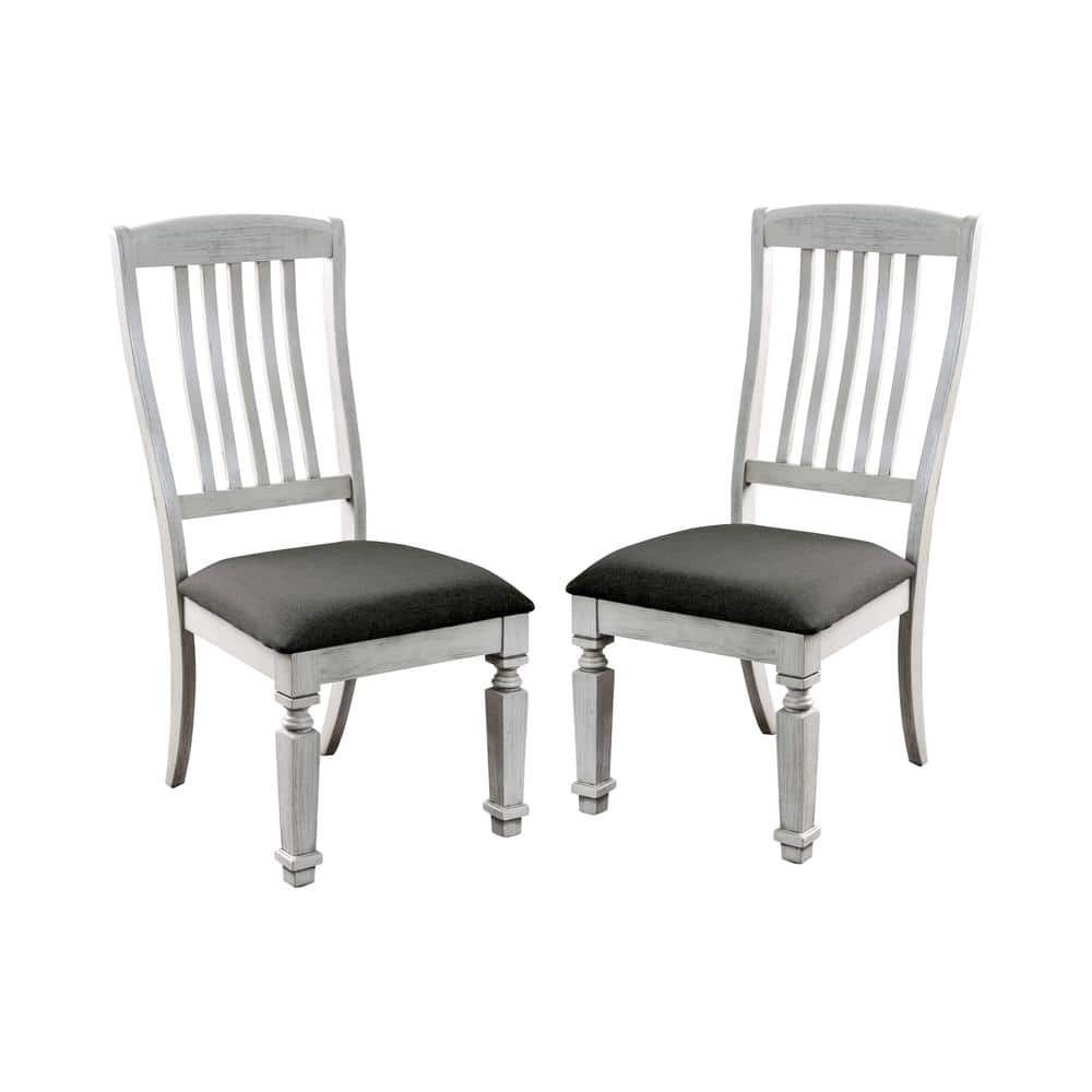 https://images.thdstatic.com/productImages/a38c719e-c8a5-4f03-b98a-d85ea5c01795/svn/antique-white-furniture-of-america-dining-chairs-idf-3089sc-64_1000.jpg