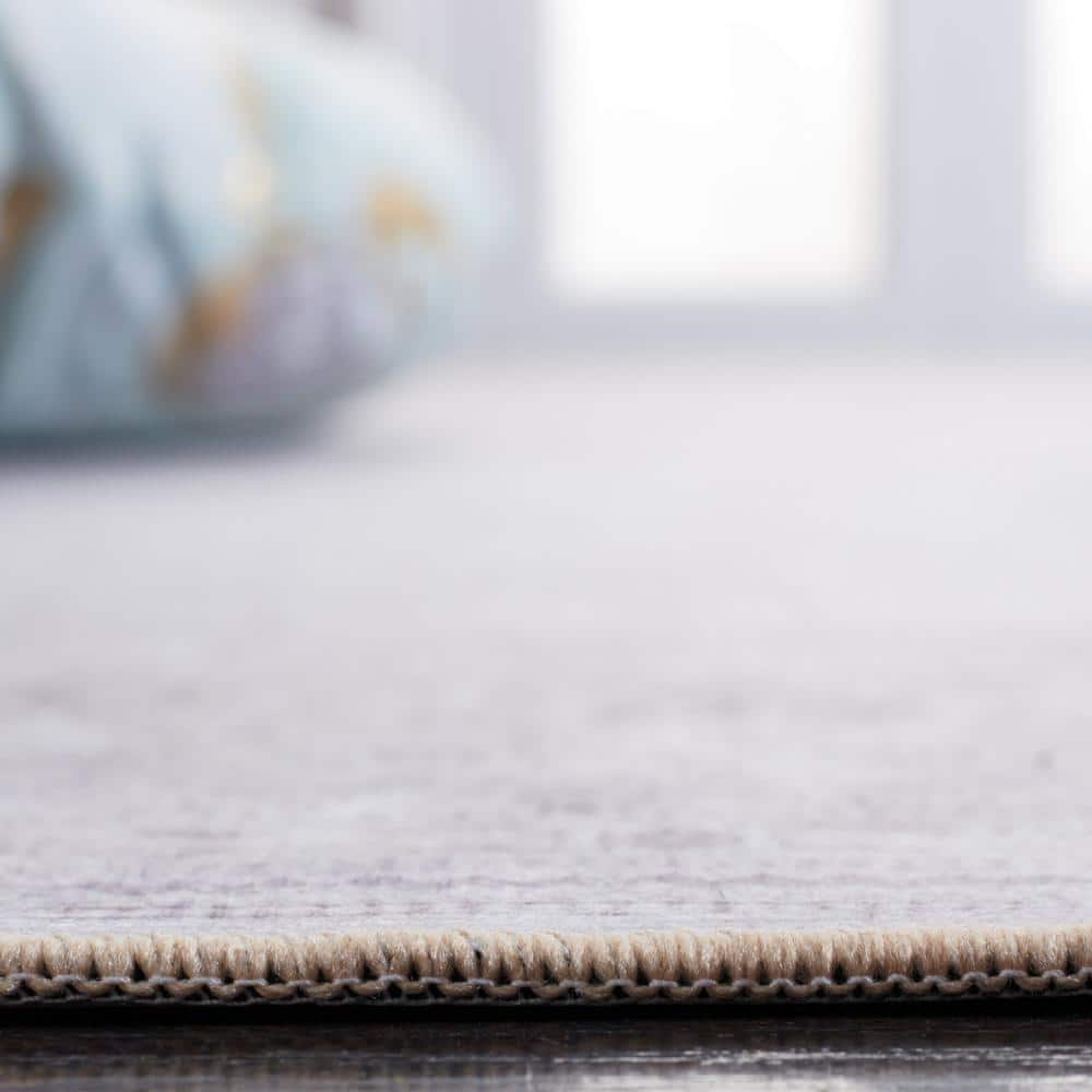 Ivory Elegance 6' x 9' Synthetic Machine Washable Rug