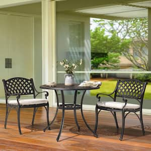 Antique Bronze 3-Piece Cast Aluminum Patio Conversation Set with Tan Cushions, 36 in. Round Table and 2 Arm Chairs