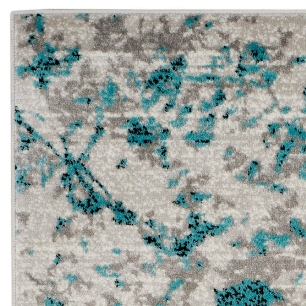 Vibrant Blue and Ivory Abstract Synthetic 6' x 9' Area Rug