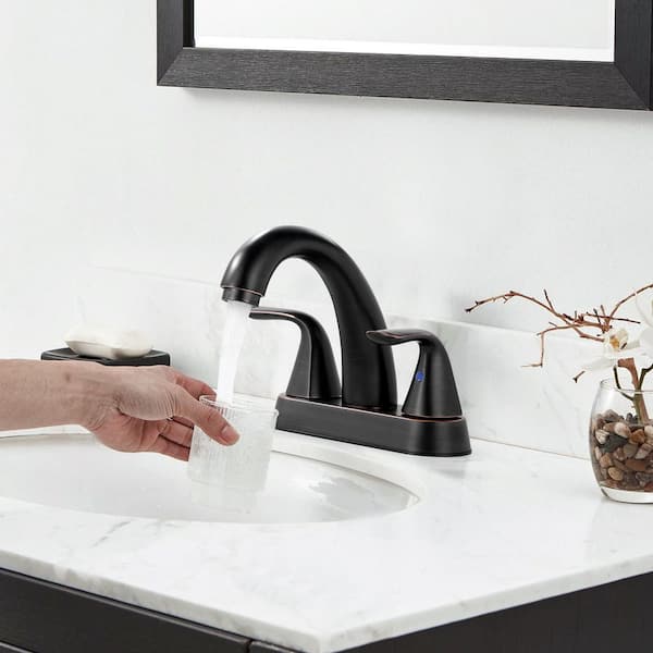 4 in. Centerset Double Handle Bathroom Faucet with Drain Kit Included in Oil Rubbed Bronze
