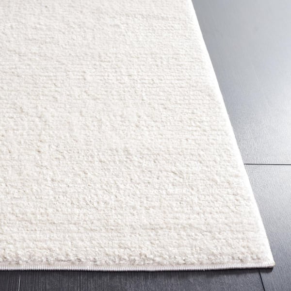 SAFAVIEH Melody Ivory 10 ft. x 14 ft. Solid Parallel Area Rug
