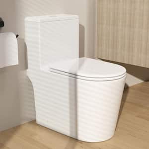 One-piece 1.1/1.6 GPF High Efficiency Dual Flush Elongated Toilet in Gloss White Soft-Close Seat Included