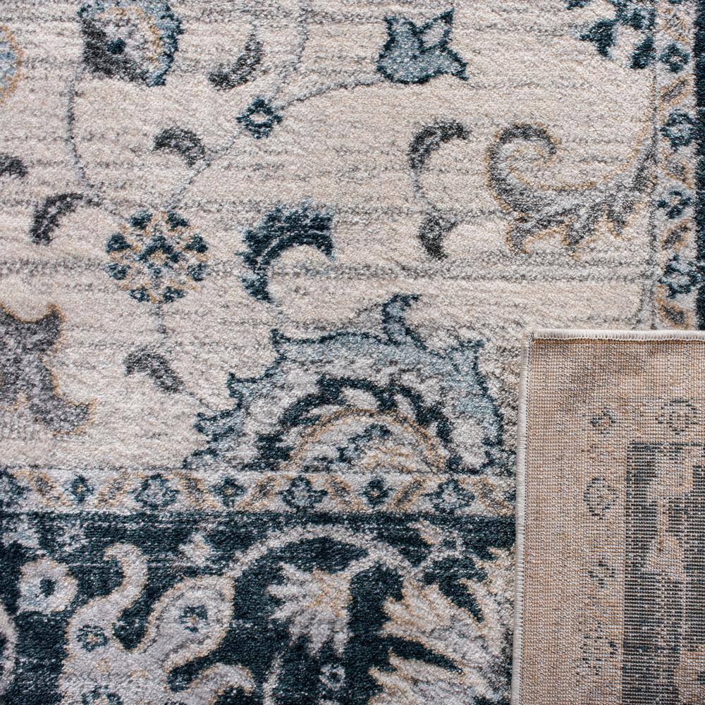 Isabella Cream and Navy 4' x 6' Synthetic Oriental Area Rug