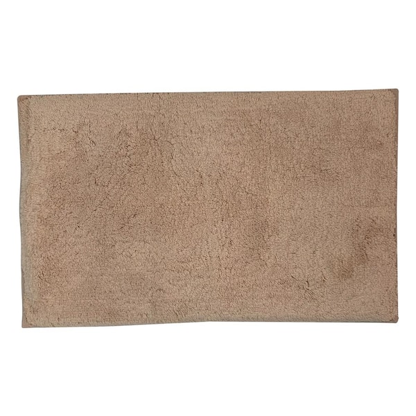 https://images.thdstatic.com/productImages/a40bae37-d227-4314-b3b5-2059a418cea1/svn/beige-solid-better-trends-bathroom-rugs-bath-mats-ss-bajc022032be-c3_600.jpg