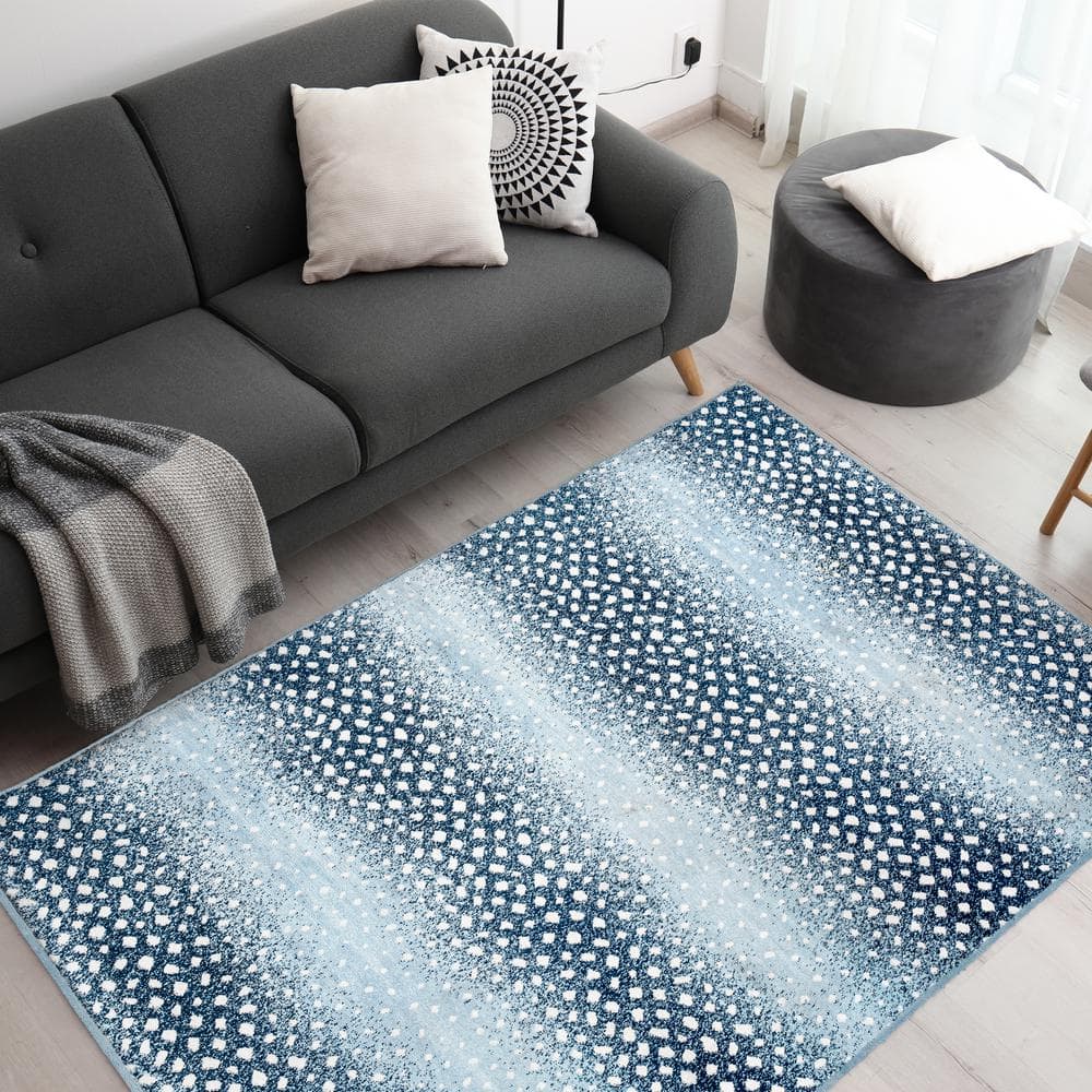 Ivory and Blue Abstract Antelope Washable Area Rug