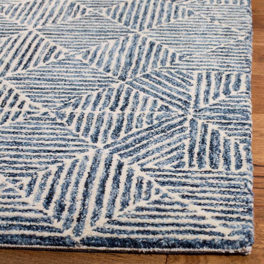 Handmade Blue and Ivory Wool Abstract Area Rug, 5' x 8'