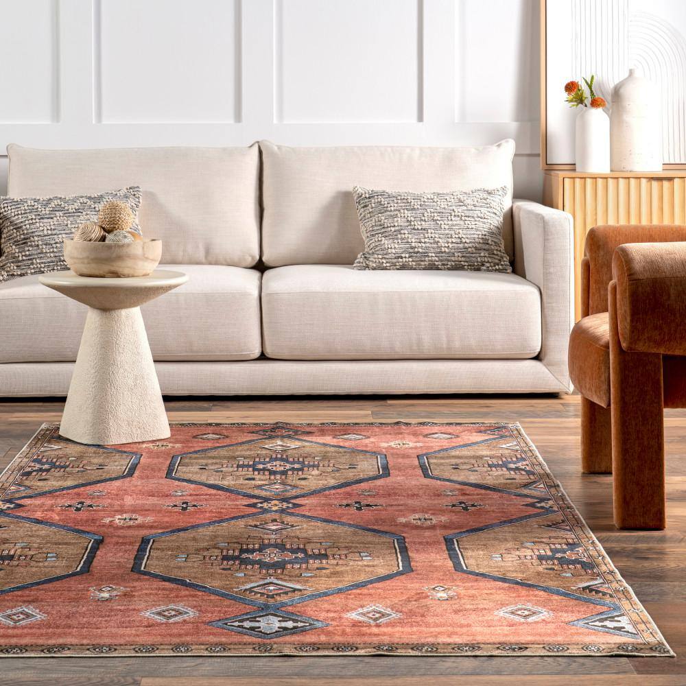 Judy 4' x 6' Rust and Brown Synthetic Medallion Area Rug
