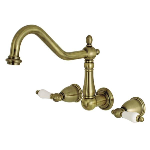 Juno Classic Antique Brass Wall Mount Bathroom Faucet with Hand