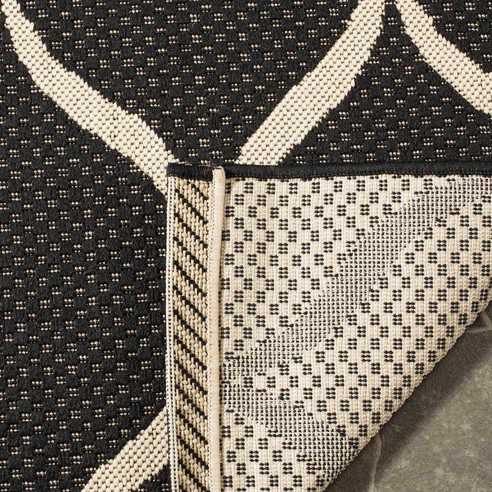 Black and Beige Geometric Indoor/Outdoor Area Rug 4' x 5'7"