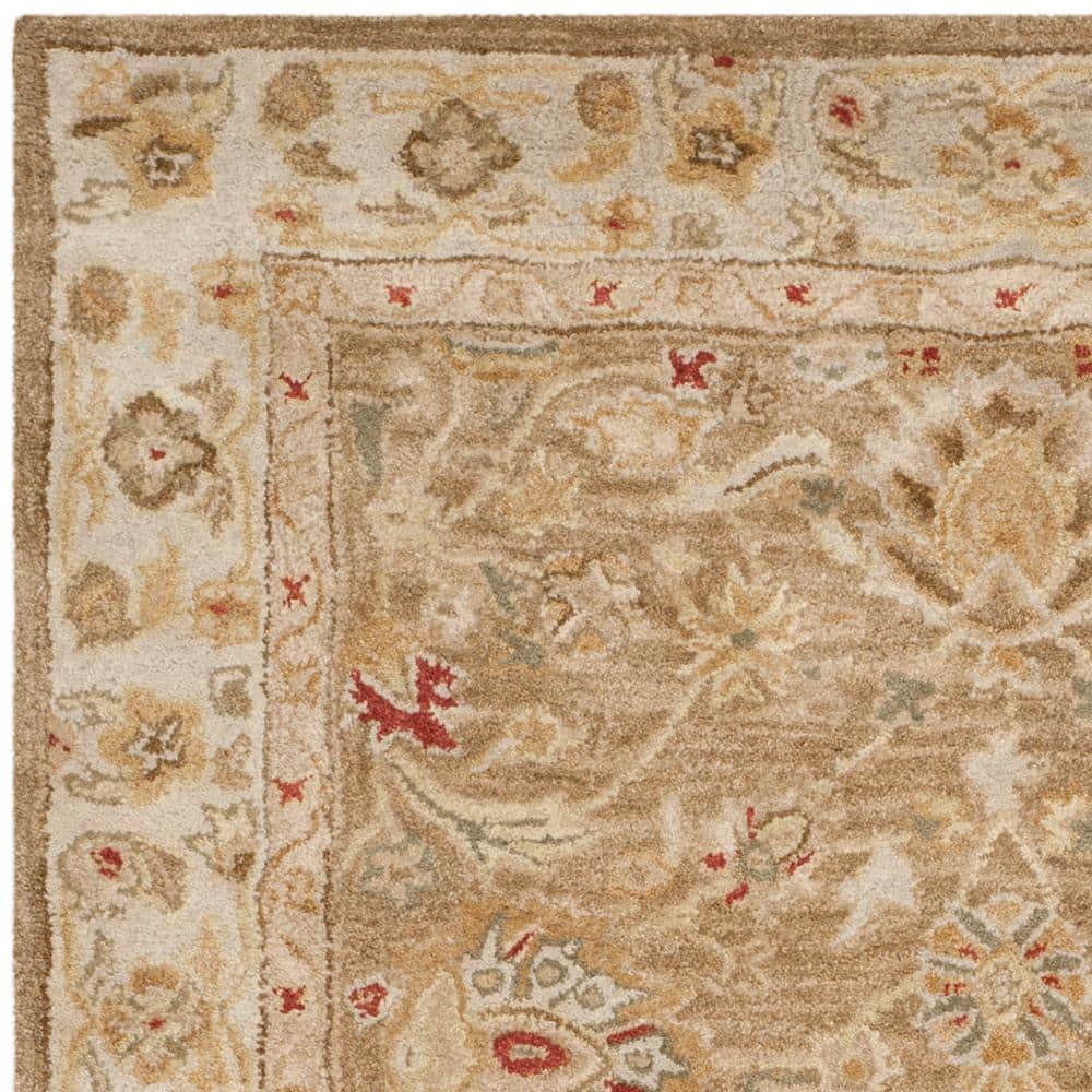 Handmade Beige and Red Floral Wool Area Rug 6' x 9'
