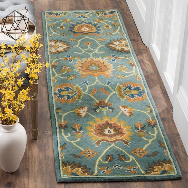 Heritage 2 ft. x 6 ft. Light Blue Border Ornate Runner Rug