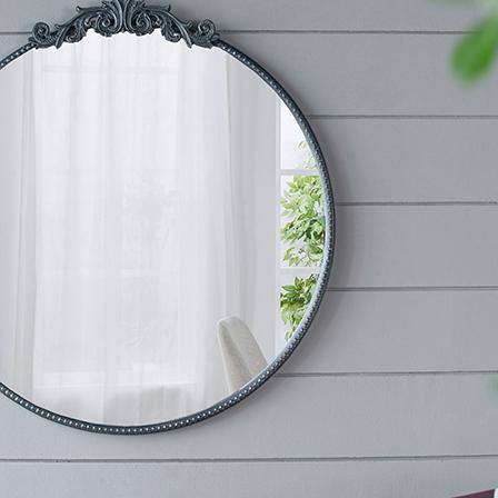 30" Black Metal Round Wall Mirror with Carved Rose Detail