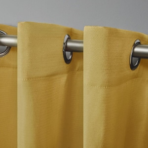 Delano Sunbath Yellow Solid Light Filtering Grommet Top Indoor/Outdoor Curtain, 54 in. W x 84 in. L (Set of 2)