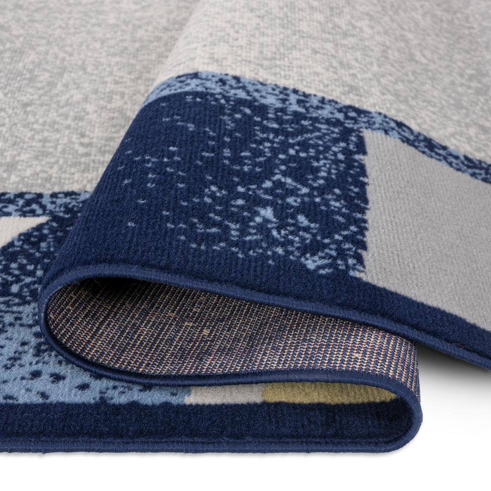 Navy and Red Synthetic Stain-Resistant Area Rug, 5'3"x7'5"