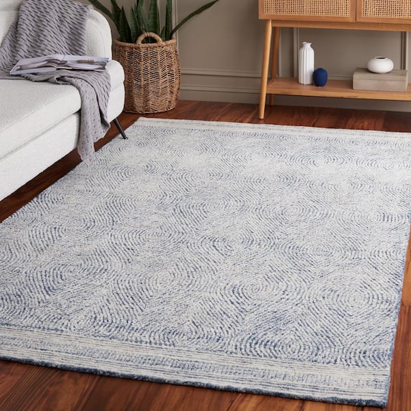 Abstract Ivory/Navy 5 ft. x 8 ft. Geometric Area Rug