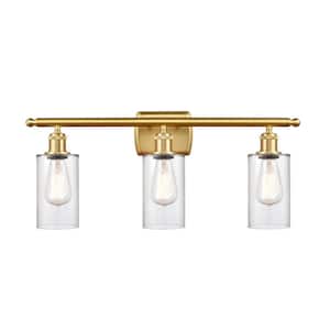 Clymer 26 in. 3-Light Satin Gold Vanity Light with Clear Glass Shade