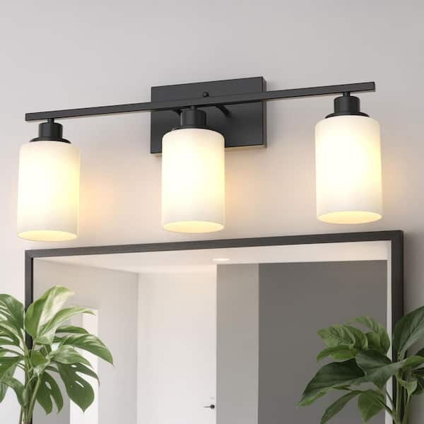 24 in. 3-Light Matte Black Industrial Bathroom Vanity Light with White Glass Shades