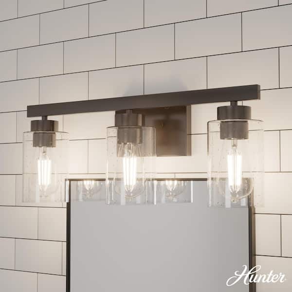 Hunter Hartland 13 in. 3-Light Noble Bronze Vanity Light with Clear Seeded Glass Shades