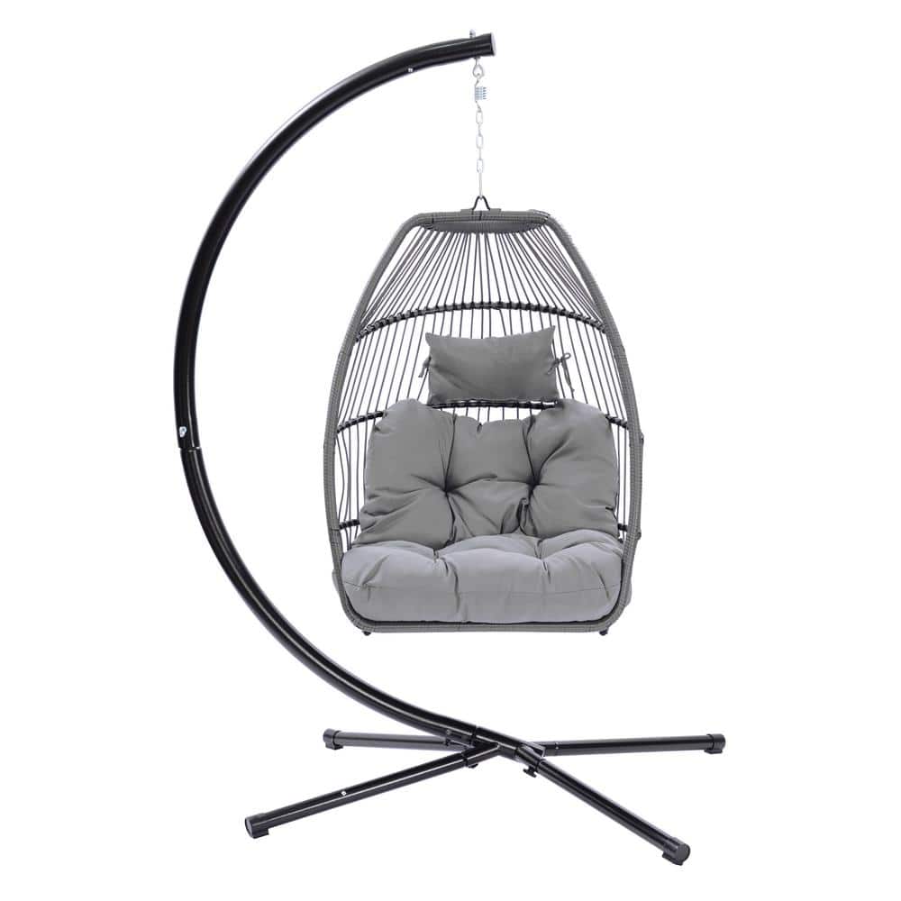 1-Person Black Metal Frame Patio Swing with Brown Rattan Basket and Grey Cu