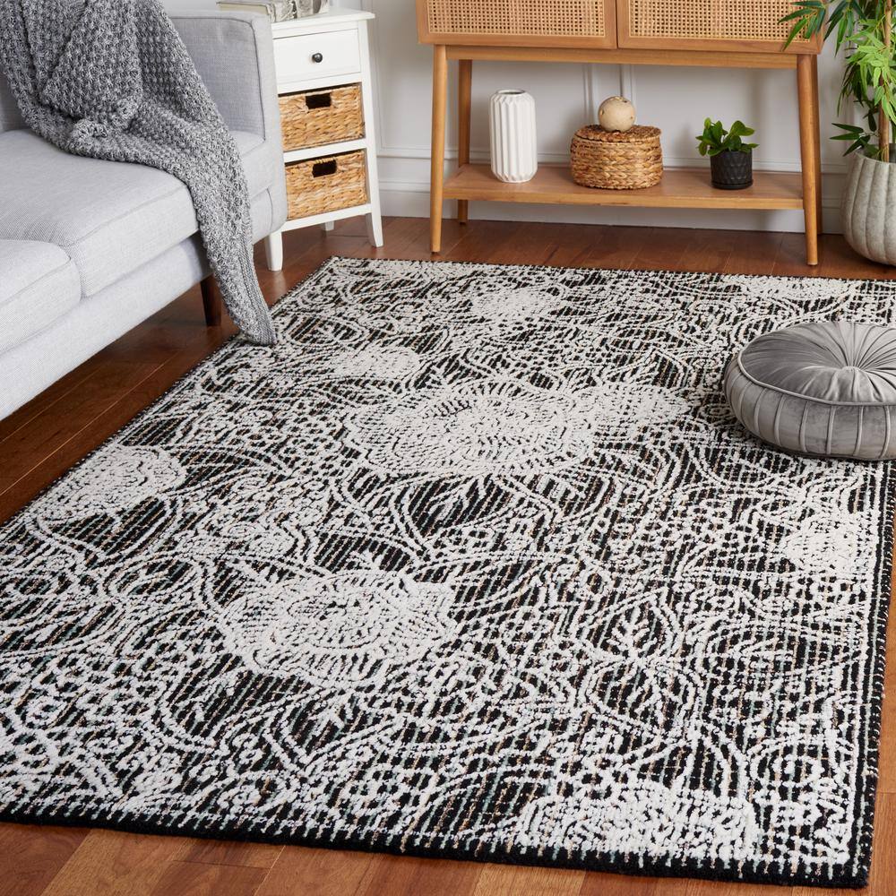 Handmade Black Wool 6' x 9' Tufted Area Rug