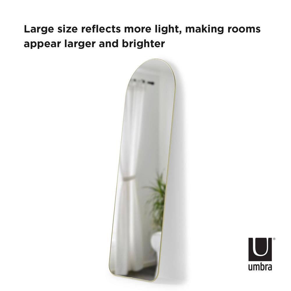 Elegant Arch Brass Leaning Floor Mirror with Sleek Metallic Rim