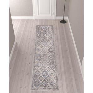 10 ft. Ivory and Tan Floral Power Loom Distressed Washable Runner Rug