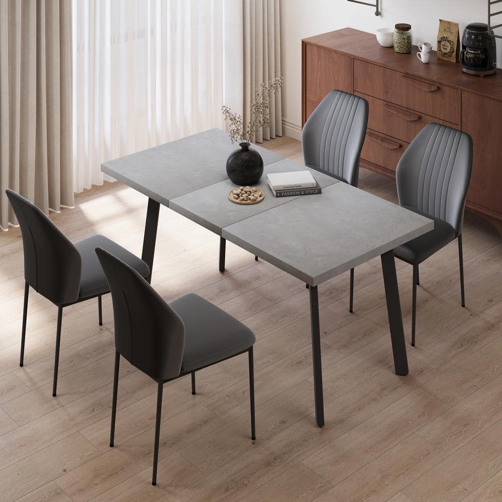 GOJANE 5-Piece Set of 4 Black Chairs and Rangtangle Dining Table