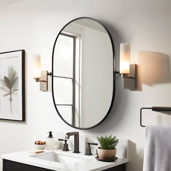 Black 22.62 in. W x 31.2 in. H Wrought Iron Oval Hardware Frame Wall Mirror