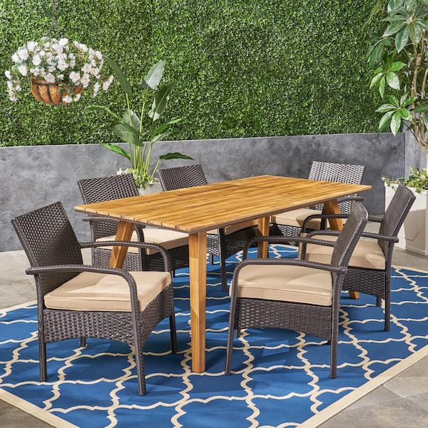 Noble House Durham Teak Brown 7-Piece Wood and Brown Faux Rattan Outdoor Dining Set with Tan Cushions