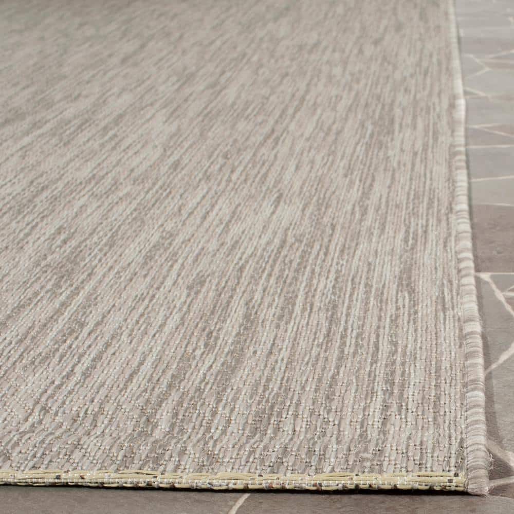 Beige Courtyard 59" Easy-Care Synthetic Indoor/Outdoor Area Rug