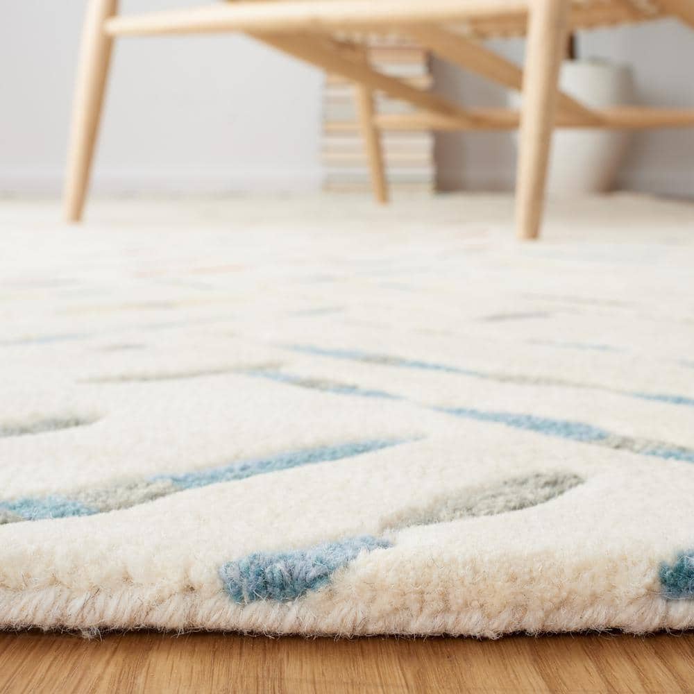 Ivory and Blue Hand-Tufted Wool 8' x 10' Area Rug