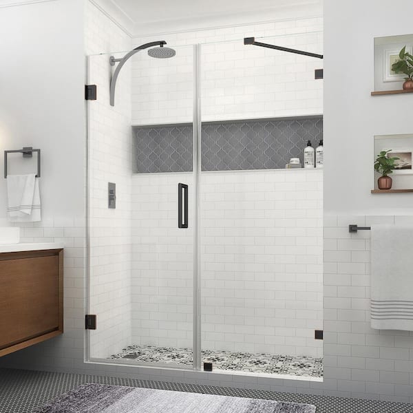 Aston Nautis XL 67.25 to 68.25 in. W x 80 in. H Hinged Frameless Shower Door in Oil Rubbed Bronze with Clear StarCast Glass
