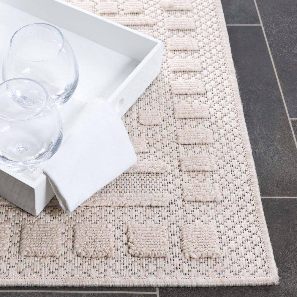 Beige Geometric 8' x 10' Synthetic Easy Care Rug