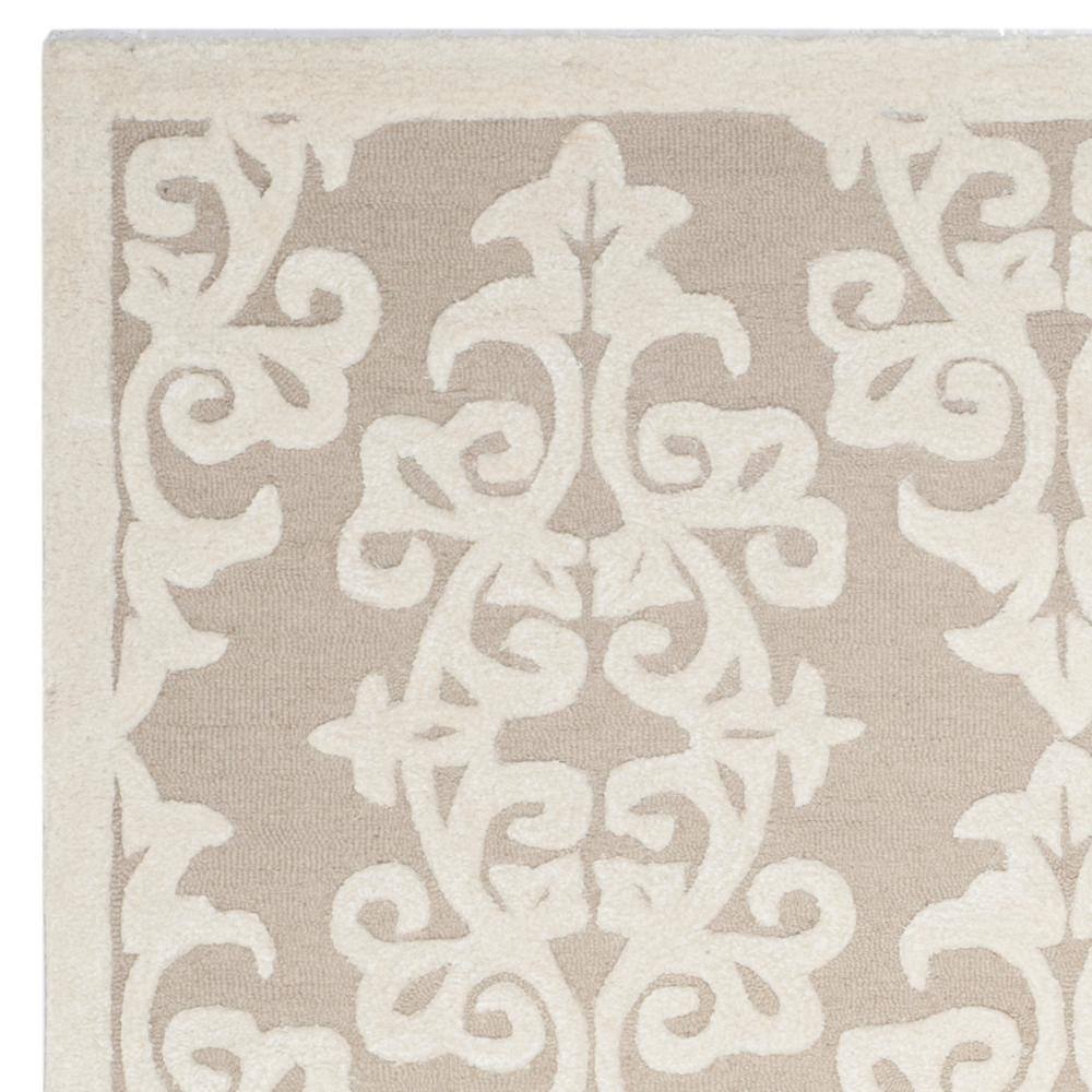 Ivory Elegance 9' x 12' Hand-Tufted Wool Rectangular Area Rug