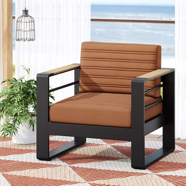 Orange Metal Outdoor Lounge Chair with Rust Orange Fabric Cushions