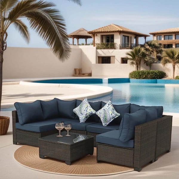 Zeus & Ruta 7-Piece Wicker Outdoor Rattan Sectional Sofa Set with Table and Dark Blue Cushions for Backyard