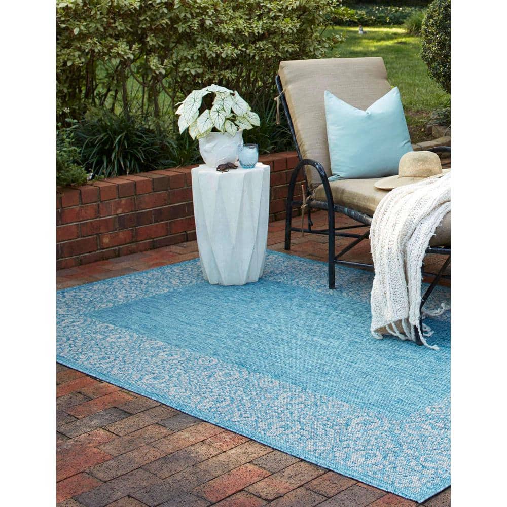 Aqua Floral Bliss Easy-Care Synthetic Outdoor Rug 7'1" x 10'
