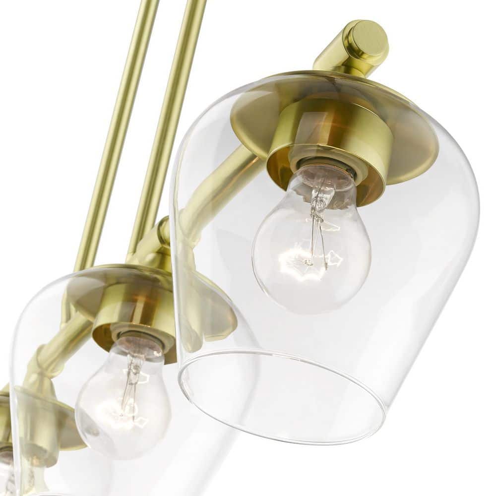 Elegant Satin Brass Linear Chandelier with Clear Glass Shades