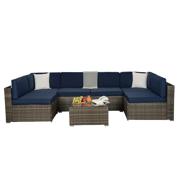 Tunearary 7-Piece Glass Top Wicker Patio Conversation Set with Navy Cushions and 2 Beige Pillows