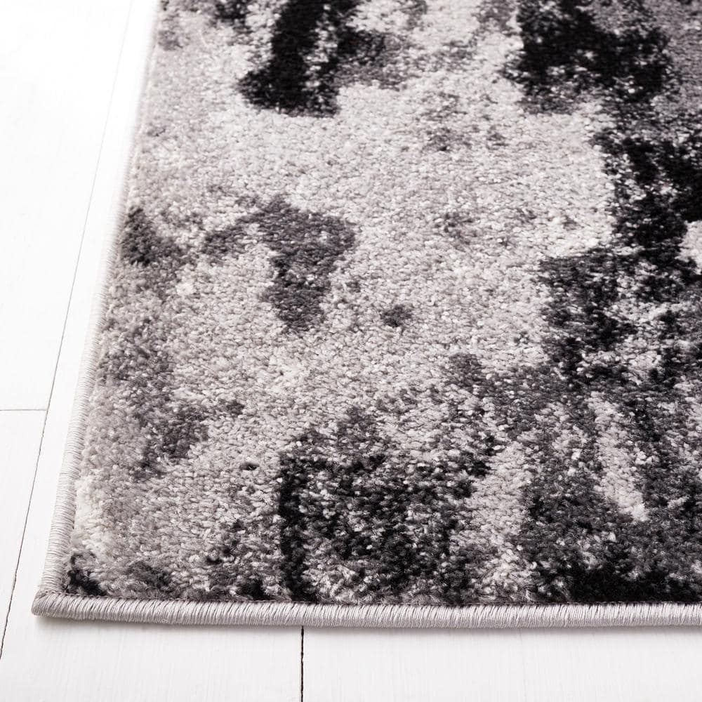 8' x 8' Grey and Black Abstract Synthetic Area Rug