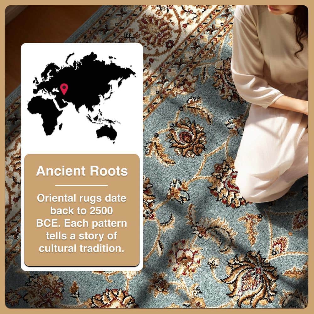 Light Blue and Ivory Synthetic Oriental Area Rug 5'3" x 7'3"