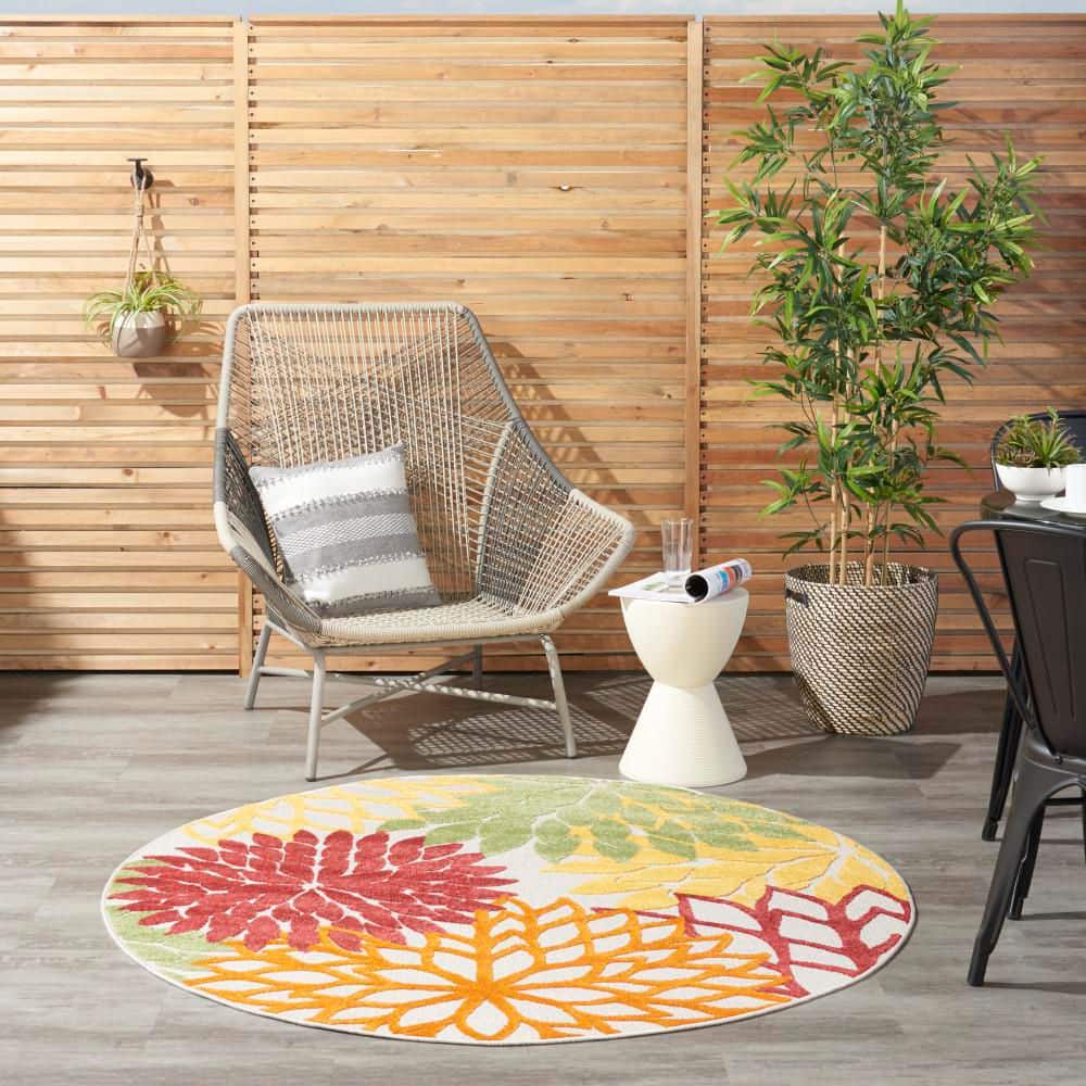 Red Floral Synthetic Round 5'3" Reversible Outdoor Rug