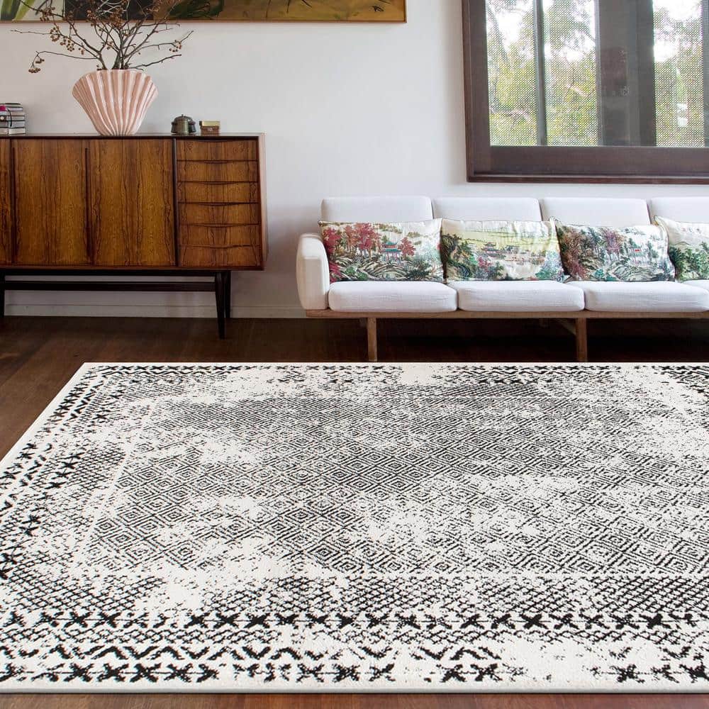 Black Geometric 5' x 7' Synthetic Easy Care Area Rug