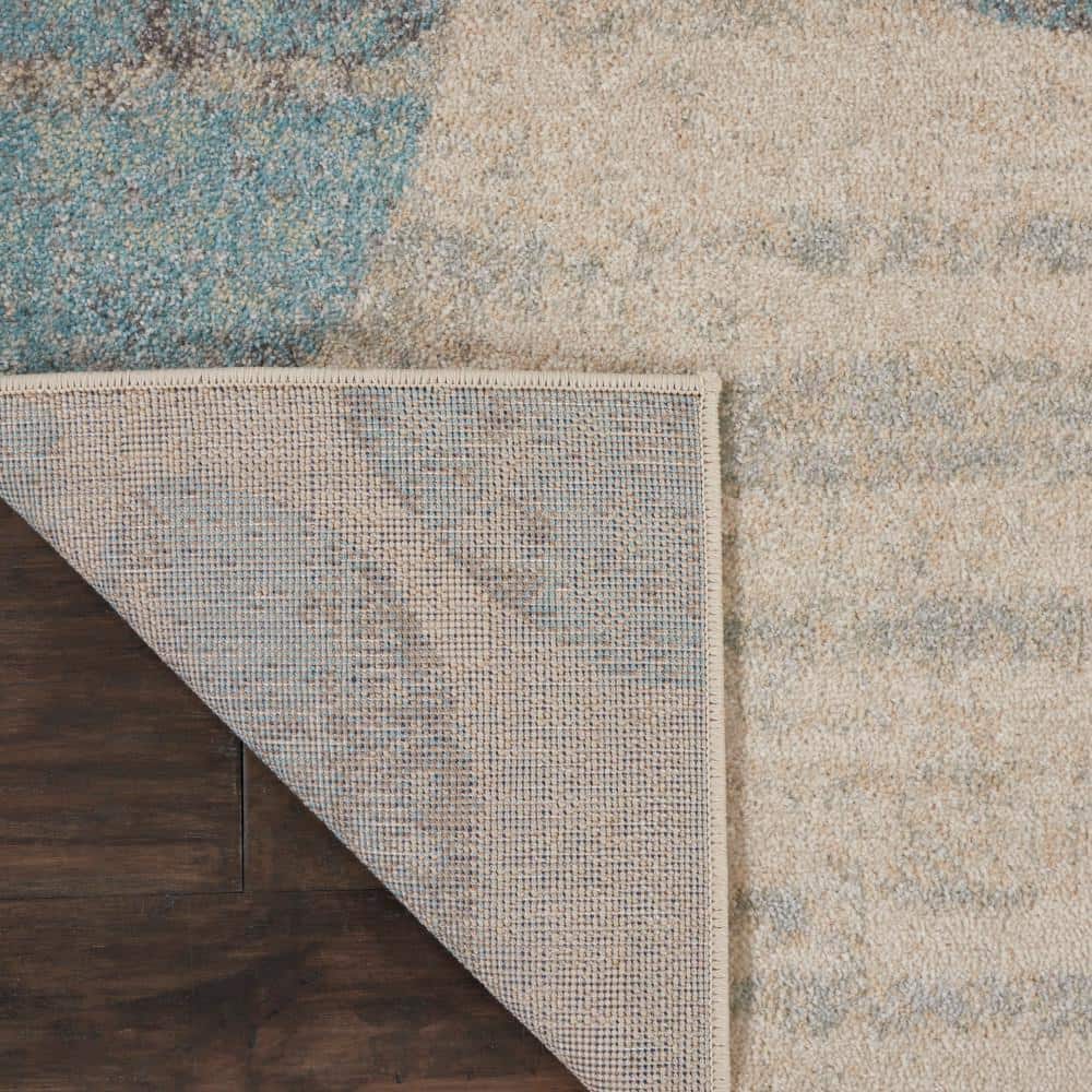 Ivory and Light Blue Floral Synthetic 8' x 10' Area Rug