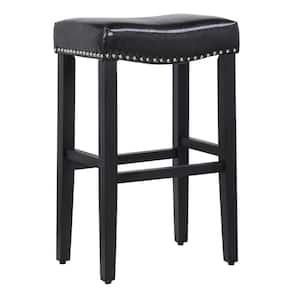 Jameson 29 in. Bar Height Black Wood Backless Nailhead Trim Barstool, Upholstered Black Faux Leather Saddle Seat Stool