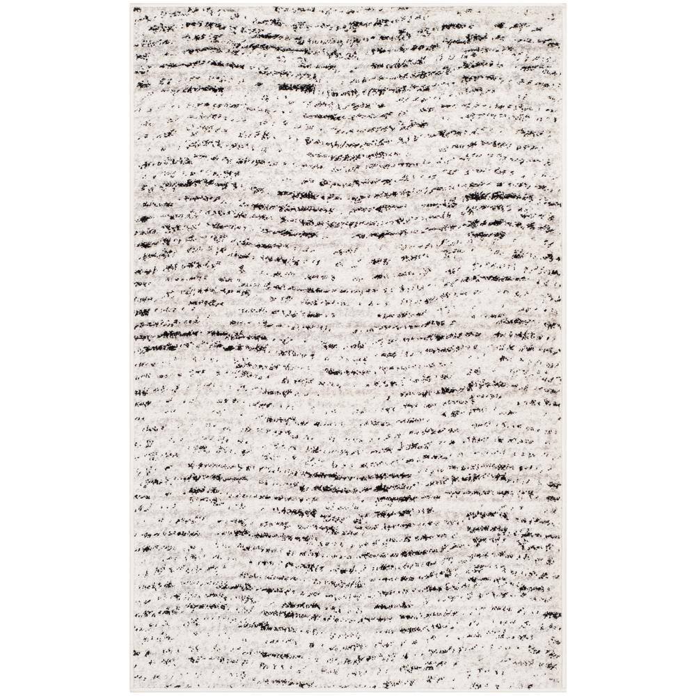 Ivory and Silver Synthetic 3' x 5' Reversible Area Rug