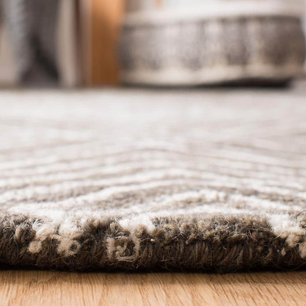 Handmade Dark Grey and Ivory Wool Tufted Round Area Rug