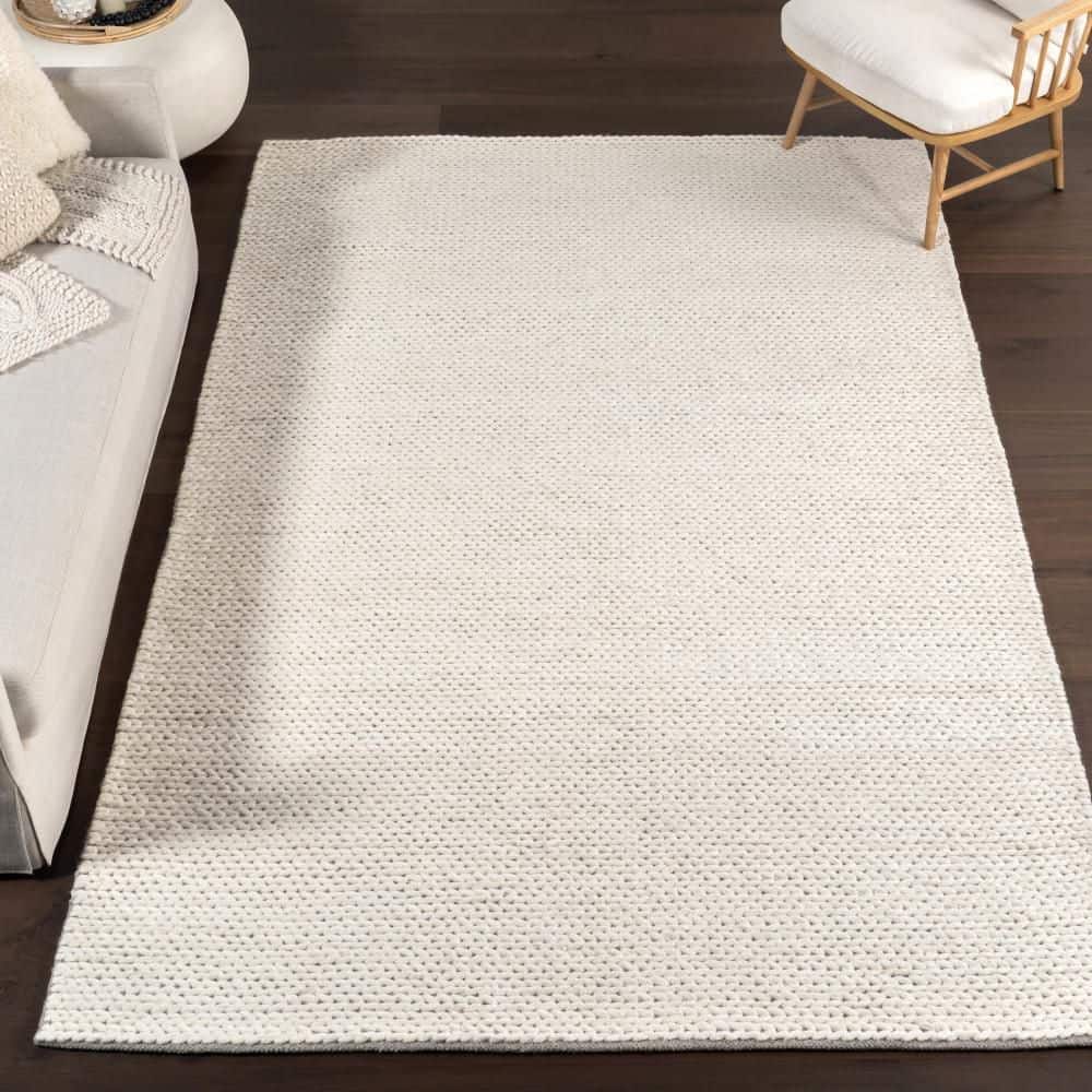 Handmade Off-White Braided Wool 5' x 8' Area Rug