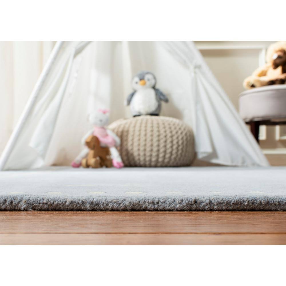 Hand-Tufted Ivory and Light Blue Wool Accent Rug 2' x 3'